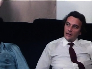 The brunette with big boobs does a hand job and blowjob