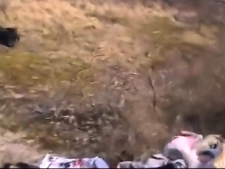 Nude Beach – Two girls share a dildo