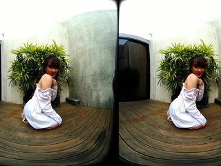 Cute Asian chick posing in her backyard